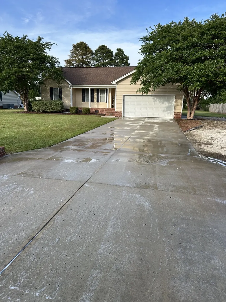 Cleaned concrete driveway at a home